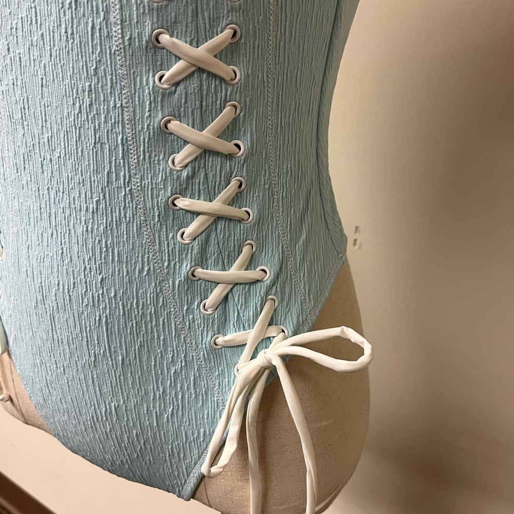 Frankie’s Bikini, Medium Kylee crinkle 1-piece. New w/tags. Beautiful pale blue.